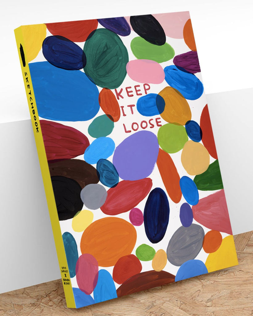 David Shrigley designed sketchbook with painted ovals and circles in various colors. The middle has hand painted text that reads 'keep it loose'. 