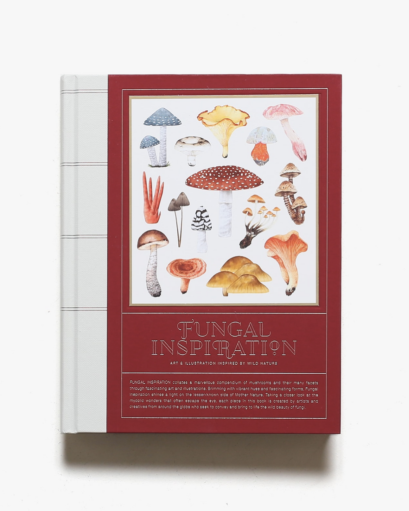 Fugal Inspiration book is a deep red color with white binding and details. A white square is on the front with different drawings of mushrooms. The title is in gold text. 