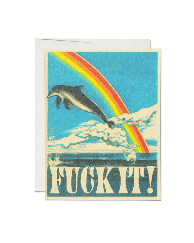 Artist designed greeting card with vintage inspired artwork. The art shows a dolphin jumping out of the water with a rainbow and clouds behind it. On the bottom, in white bold text reads, 'Fuck It!'. 