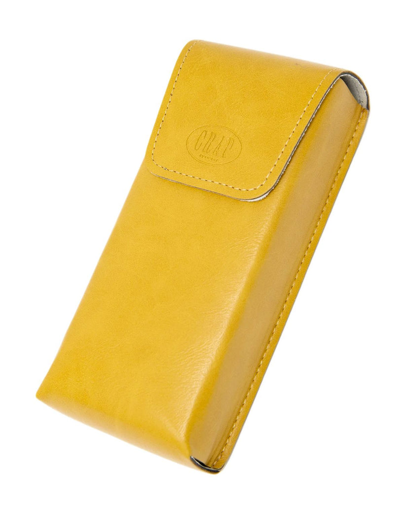 The Crap Eyewear sunglass case is a rectangular box in a yellow mustard color with a fold over magnet closure. 