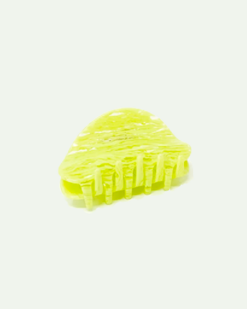 Key lime claw clip is a bright neon green/yellow color. Shown with a white backdrop.